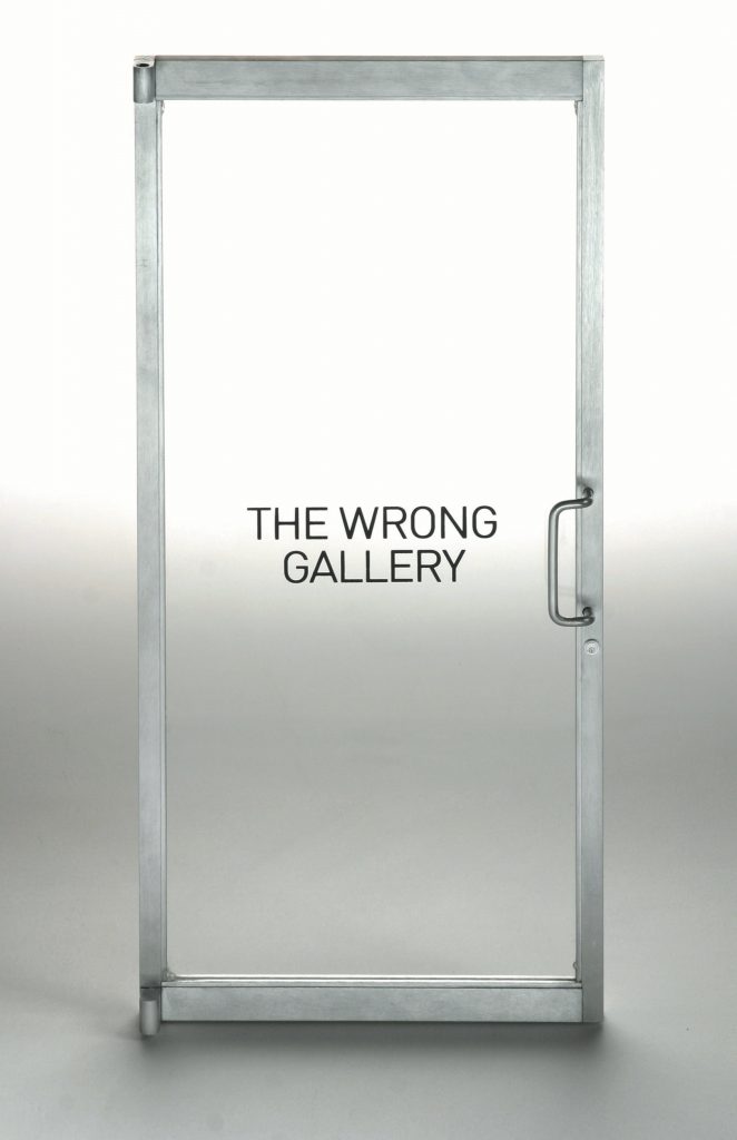 Andreas Slominski, The Wrong Gallery Door, 2005, Aluminium, Glas und Druck, 38 x 17 cm, Courtesy the artist and Produzentengalerie Hamburg, © Cereal Art, New York