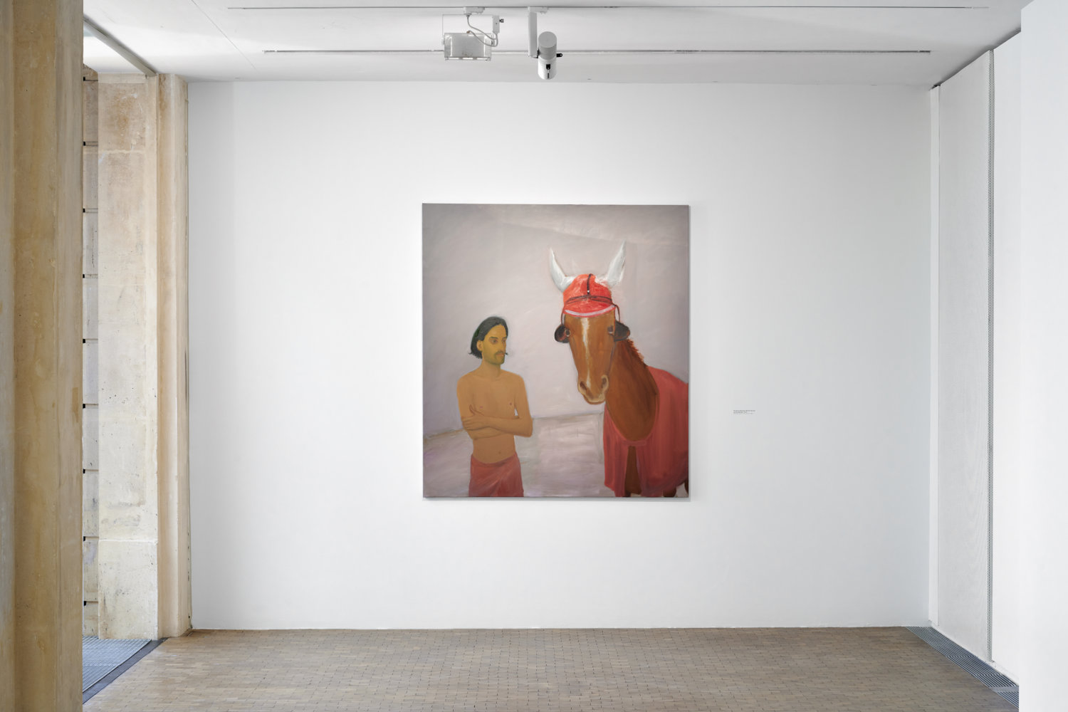 Ein Mann und ein Pferd auf einem Gemälde.